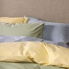 Best Påslakanset i satin ljusgul - 150x210 cm